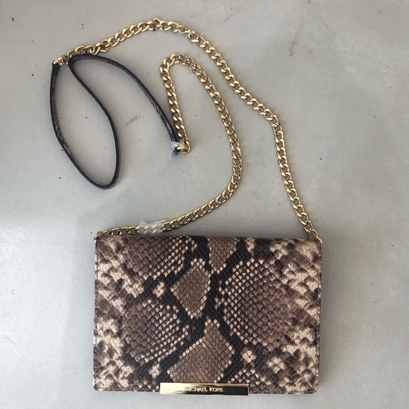 MICHAEL Michael Kors Handbags - Auth. Michael Kors convertible clutch/crossbody